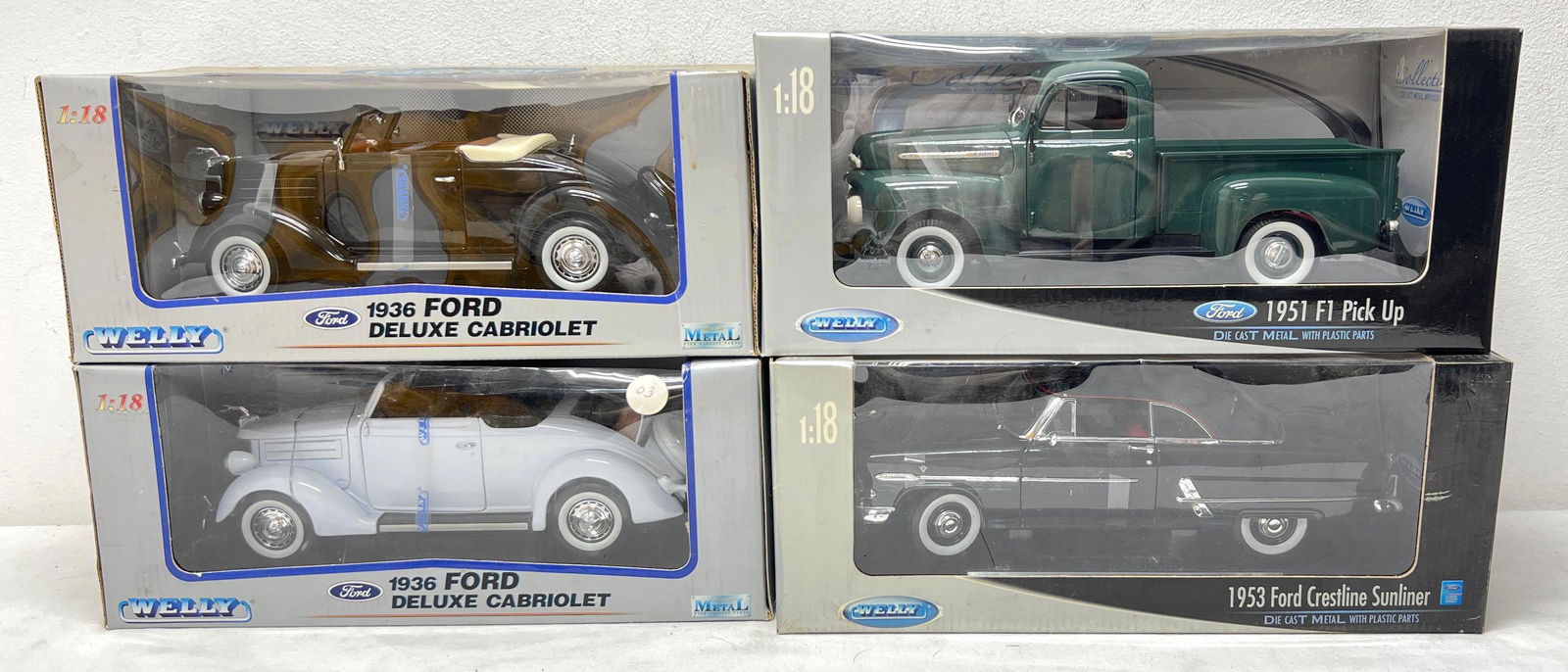 1:18 scale die-cast Four Welly Ford vehicles in boxes (1 of 3)