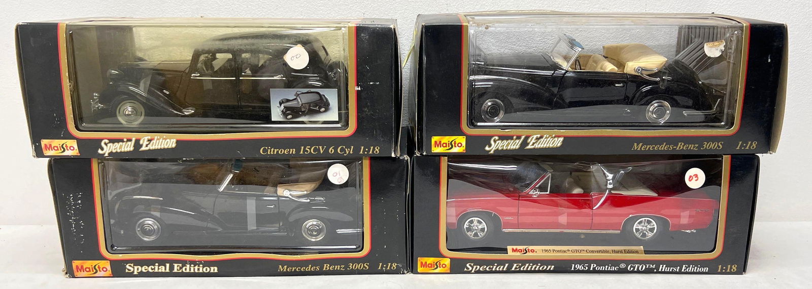 1:18 scale die-cast Four Maisto Special Edition in original boxes (1 of 3)
