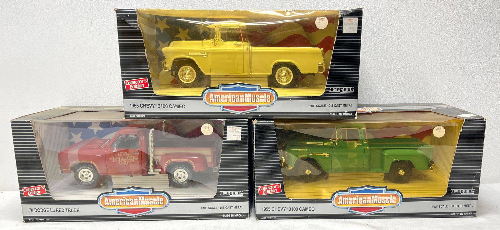 1:18 scale die-cast Three Ertl American Muscle trucks in box (1 of 4)