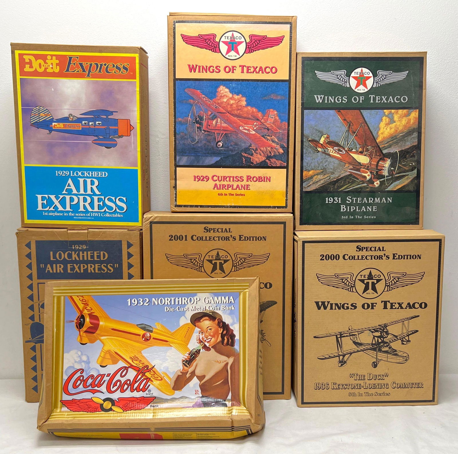 Seven Die-cast Ertl Airplane banks in original boxes (1 of 8)