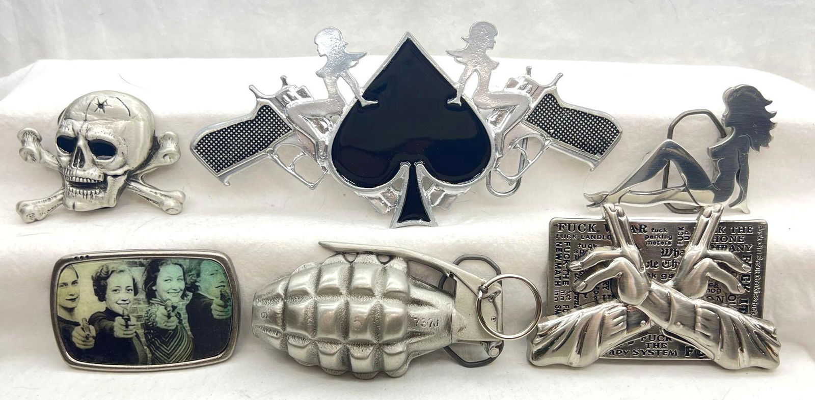 Six Belt Buckles Ace of Spade Skull and Cross Bones Grenade and More: Six Belt Buckles Ace of Spade Skull and Cross Bones Grenade and More. This lot includes, The Dragon Collection Hand Grenade Belt Buckle, pure pewter and numbered DD142, 2005 Mobtown Ace of Spade belt