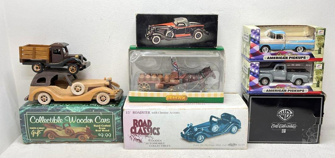 Liberty Classics Lemax Ertl Avon vehicles in box: Liberty Classics die-cast trucks, Lemax die-cast beer wagon, Ertl die-cast 1940 Warner Bros. Ford Woody, Avon 1932 Auburn Boattail Speedster decanter and a Road Classics 15" Roadster with Chrome A
