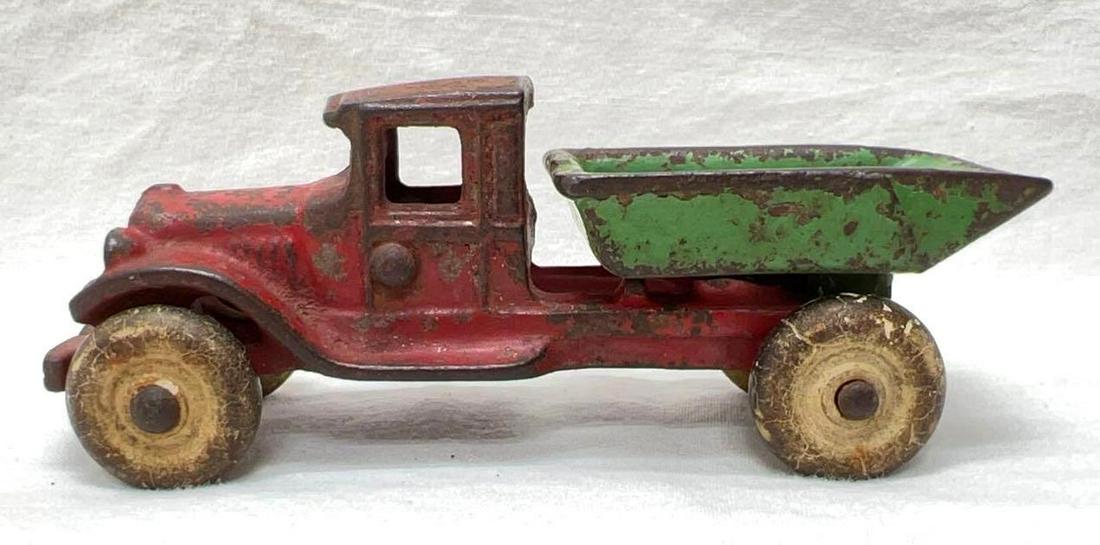 Arcade 186 4.25" dump truck cast iron original paint tires: Arcade 186 dump truck, measures approximately 4.25" four and one quarter inches long, 1930's cast iron with original paint and tires, no damage or repairs. Some very light surface rust and sto