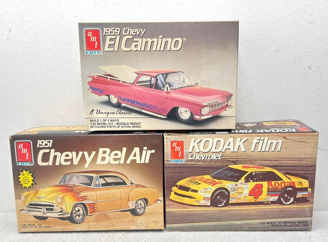 AMT 6727 6607 6897 1/25 unbuilt kits in original boxes: AMT 6727 KODAK film Chevrolet, painted parts, kit appears complete with parts on sprue, instruction sheet, decals. 6607 1951 Chevy Bel Air, body has been painted and stripped, unassembled, parts on sp
