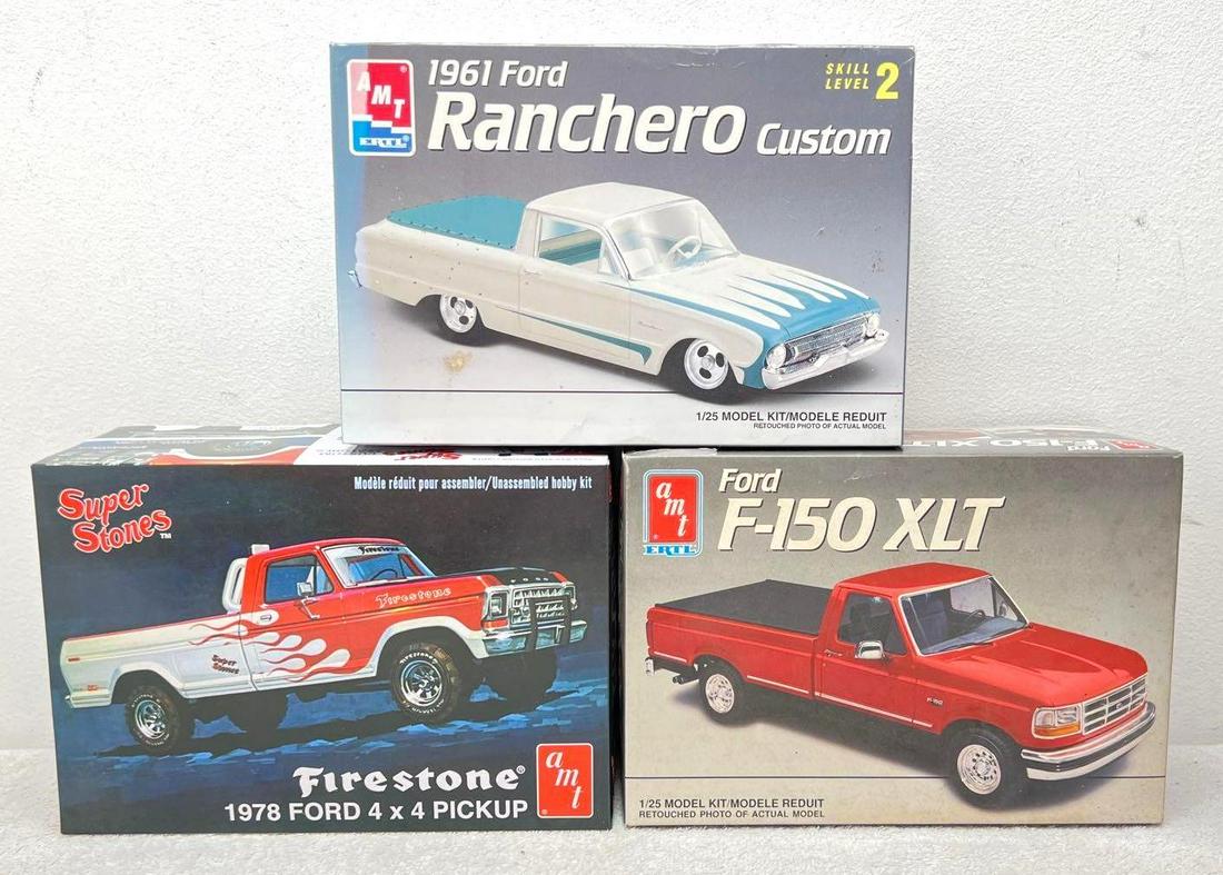 AMT 6809 8062 858/12 1/25th scale model kits in box: AMT 6809 Ford F-150 XLT, bumper has been attached to front clip, parts on and off sprue, instructions sheet, decals sheet. 8062 1961 Ford Ranchero, missing tires, otherwise appears complete with parts