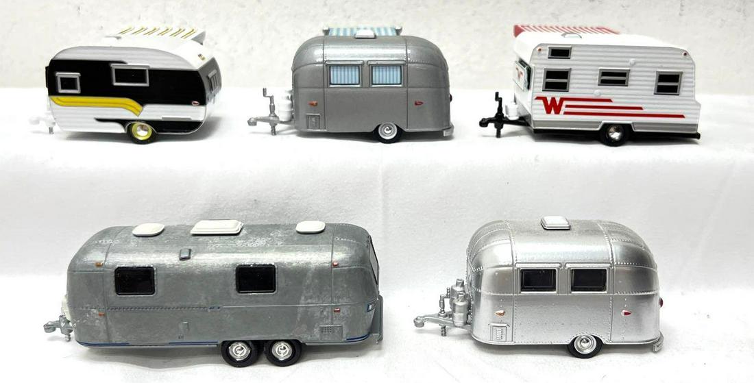 1/64 die-cast pull behind camper trailers Greenlight Airstream DeVille Winnebago: 1/64 scale die-cast pull behind camper trailers from Greenlight; three Airstream, one DeVille and one Winnebago. Toy vehicles were displayed, not played with. Some display dust, no apparent damage. So