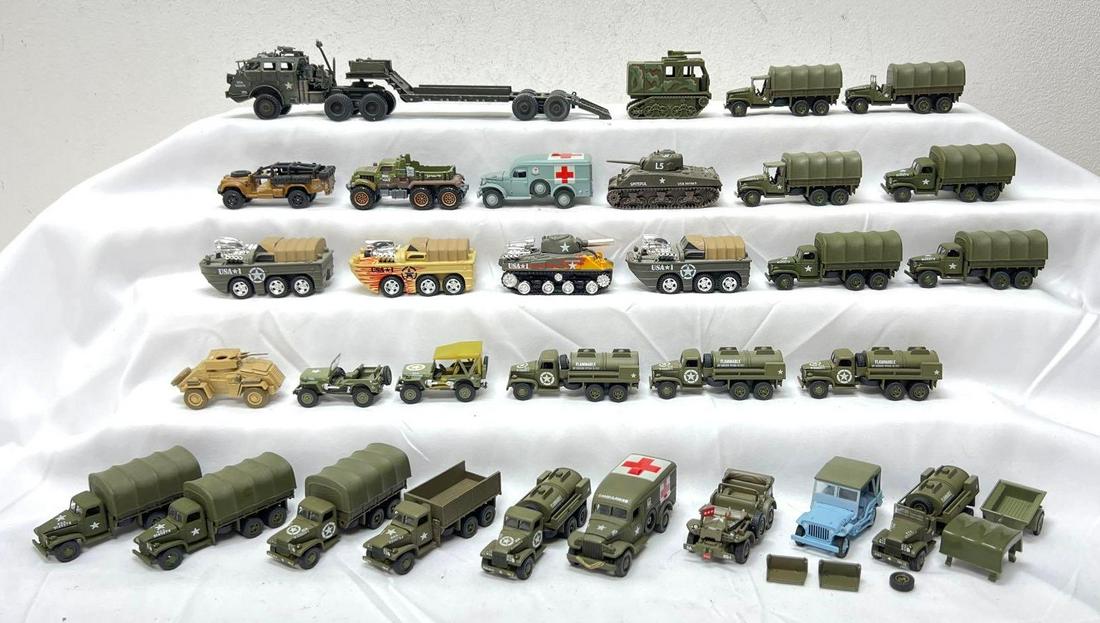 Thirty-one Johnny Lightning Greenlight Corgi Hot Wheels Matchbox Muscle Machines: Twenty-seven 1/64 scale die-cast Johnny Lightning, Greenlight, Corgi, Hot Wheels, Muscle Machines and Matchbox military vehicles. Nineteen Johnny Lightning trucks, Jeeps, Ambulance, tankers, etc. Two