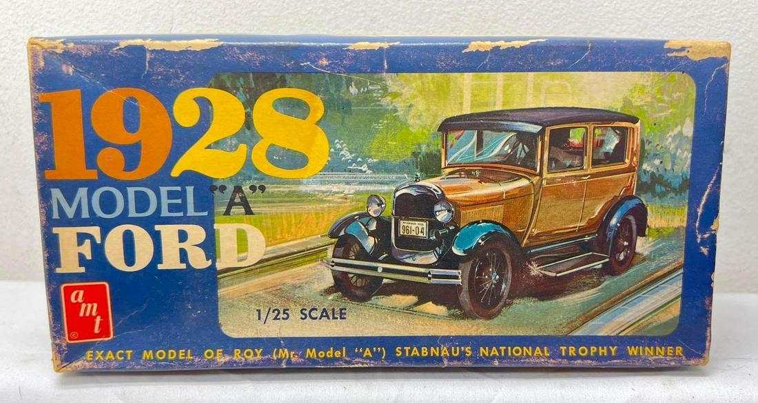 1/25 AMT 2128-150 1928 Model A Ford unbuilt complete in box: 1/25 scale AMT 2128-150 1928 Model A Ford model kit; unbuilt, appearing complete with parts on and off sprue, instructions sheet, decals sheet in original box. Box shows some light wear to some edges.