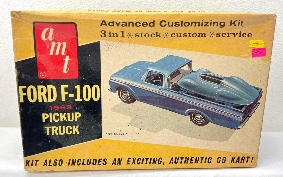 AMT 1/25 8133-200 '63 Pickup Truck with Go-Kart built complete in box: AMT 1/25 scale 8133-200 Ford F-100 '63 Pickup Truck with Go-Kart model kits; built, both look complete with instructions sheet in original box. Box shows little wear, price sticker. Carefully view the