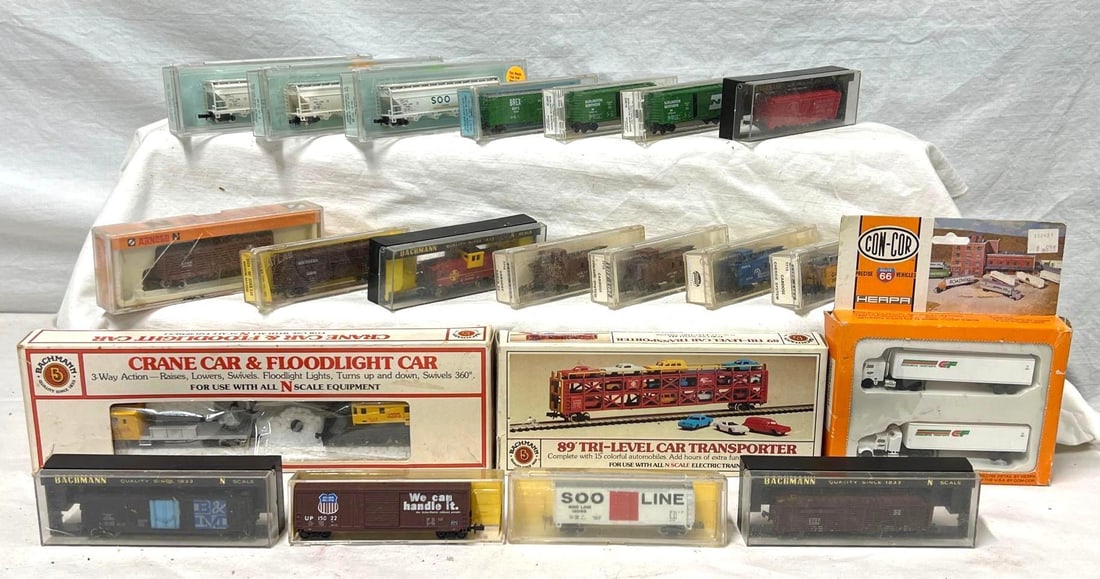Modern Era N Scale Bachmann Life-Like Atlas Arnold Micro: Modern Era N Scale freight trains; Bachmann, Life-Like, Atlas, Arnold, Micro-Trains C6 to C8. Packages show light wear. Con-Cor semi tractors and trailers in original box. Twenty-one trains total. Ple