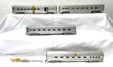 Four HO Gauge American Model Toy aluminum passenger cars unfinished