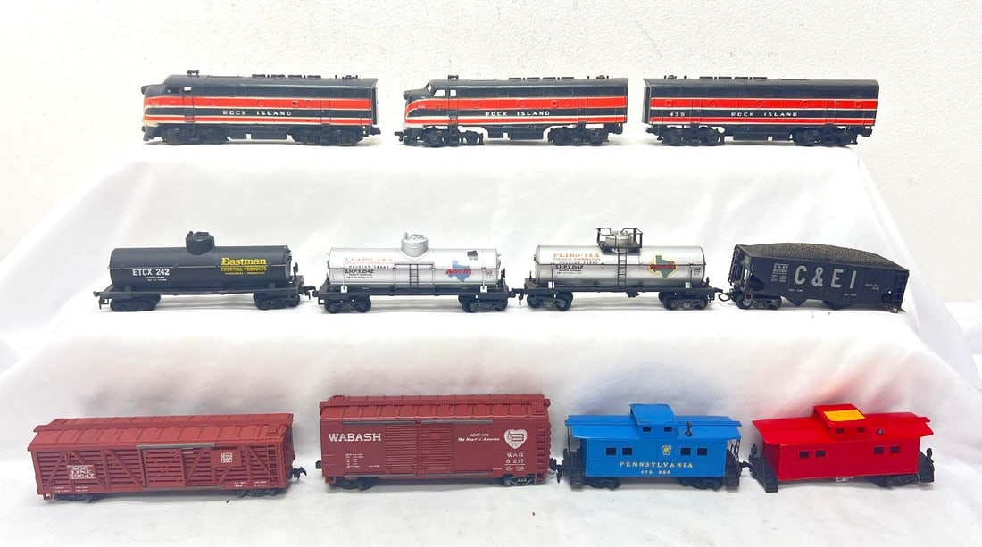HO Scale Varney Rock Island A-B-A diesel locos eight freight cars: HO Scale Varney Rock Island A-B-A diesel locomotives and eight freight cars (caboose are unmarked) six cars are marked Varney, envelope with "Varney F3 Parts" marked on it. Trains look C5 to C