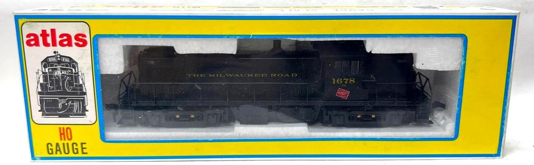 HO Scale Atlas 8124 Milwaukee Road RS-1 diesel unrun in box: HO Scale Atlas 8124 Milwaukee Road RS-1 diesel locomotive unit road number 1678, unrun in box C9-10. Box shows little wear, very square and solid.