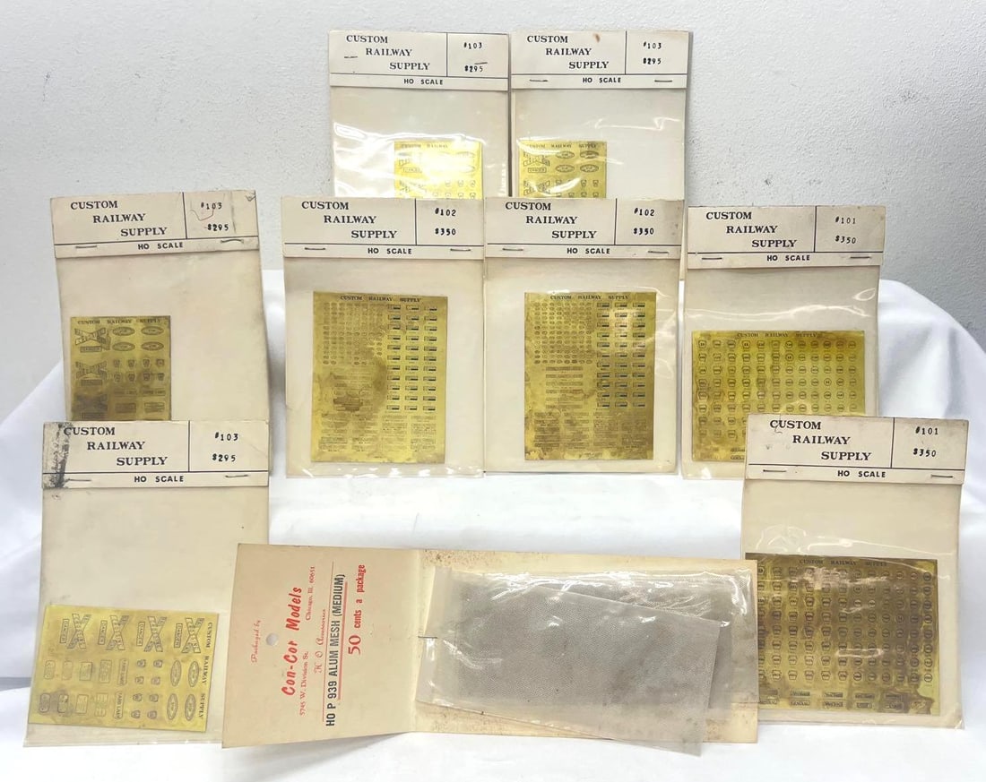 HO Scale Custom Railway Supply decals Con-Cor P939 mesh NOS: HO Scale Custom Railway Supply decals; two 101, two 102, four 103 and Con-Cor P939 aluminum mesh, NOS New Old Stock in factory sealed packages. Please view the photos of the items in this lot carefull