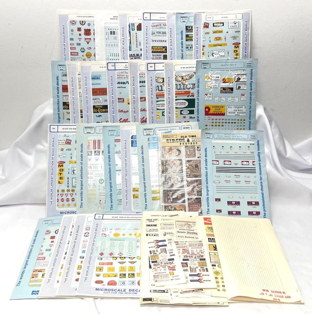 Twenty-seven Microscale Decal commercial railroad More: Twenty-seven Microscale Decal commercial, railroad, Western Cowtown, Small Town, industrial, 20th Century, mid-20th Century, delivery vans and more in original packets. Most are NOS New Old Stock, unu