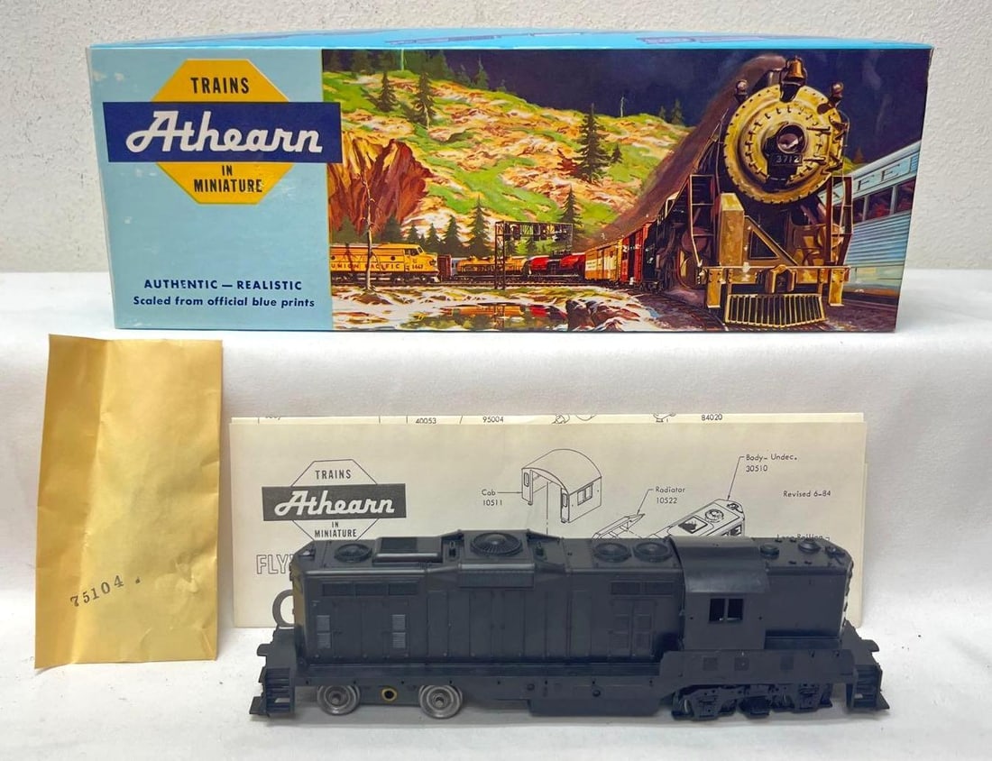 Athearn HO Gauge 3151 GP9 powered undecorated unrun: Athearn HO Gauge 3151 GP9 diesel locomotive powered, undecorated, unrun, missing one truck side frame in original box. Loose handrails and trim in envelope. Box shows little wear, price sticker. Pleas