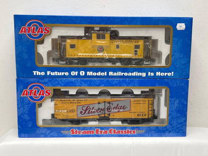 Atlas 6619-1 DM&IR EV caboose 6734 Silver Eagle Beer: Modern Era Atlas O Gauge 6619-1 DM&IR EV caboose 3 rail and 6734 Silver Eagle Beer reefer 3 rail, both in original boxes with light run time, C8. Boxes show little wear, price stickers. Please vie