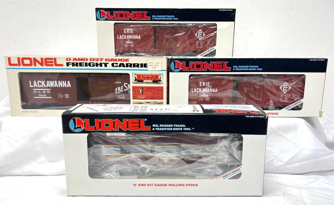 Modern Era Lionel O Gauge 9411 19809 19809 16535: Modern Era Lionel O Gauge 9411 Erie Lackawanna Phoebe Snow boxcar C9-10, two 19809 Erie Lackawanna operating boxcars C9-10, 16535 Erie Lackawanna bay window caboose C9-10, EL freight trains in origina