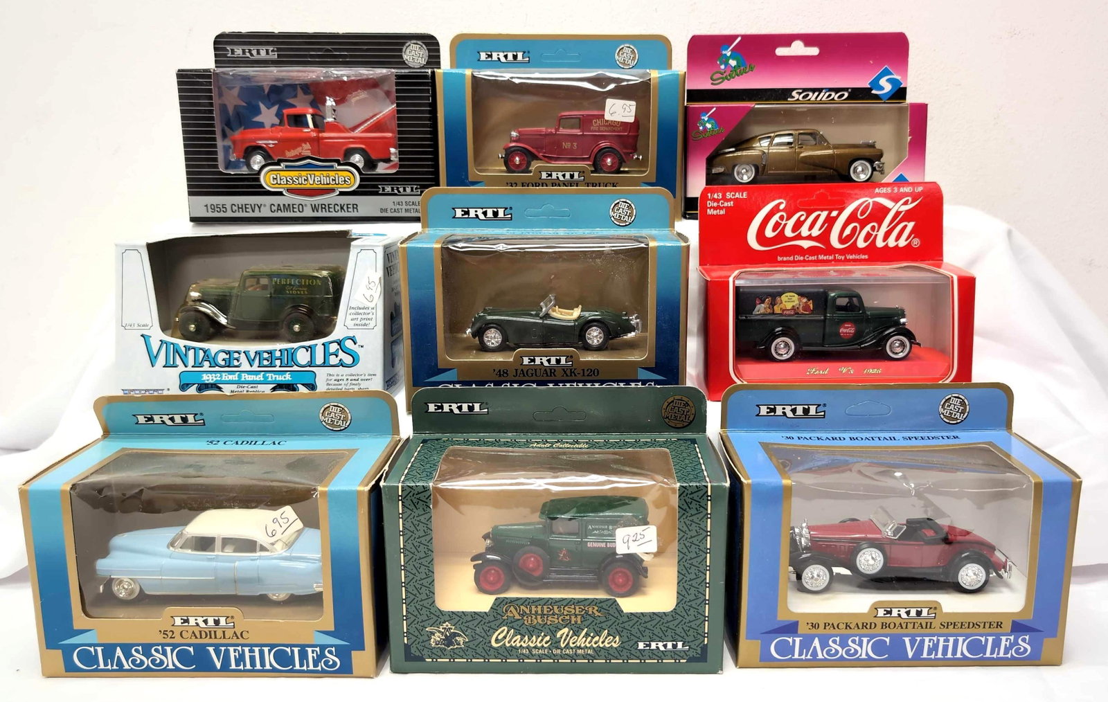 Seven Ertl and Two Solido in original packages 1:43: Seven Ertl and Two Solido in original packages 1:43, C9-10 never removed from packages. Ertl: 2504 1932 Ford Panel Truck, 2159 1955 Chevy Cameo Wrecker, 2504 '32 Ford Panel Truck, 2850 '48 Jag
