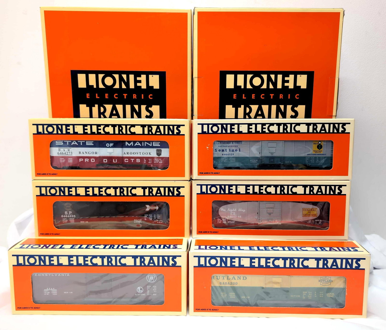 Modern Lionel O Gauge 19272 series 4 19276 series 5 6464 unrun in box: Modern Era Lionel O Gauge: 19272 series 4 and 19276 series 5, 6464 boxcars, unrun in boxes C9-10. Inner boxes show no wear, outer masters show little wear. Boxes are clean, square and solid. 19272: 19