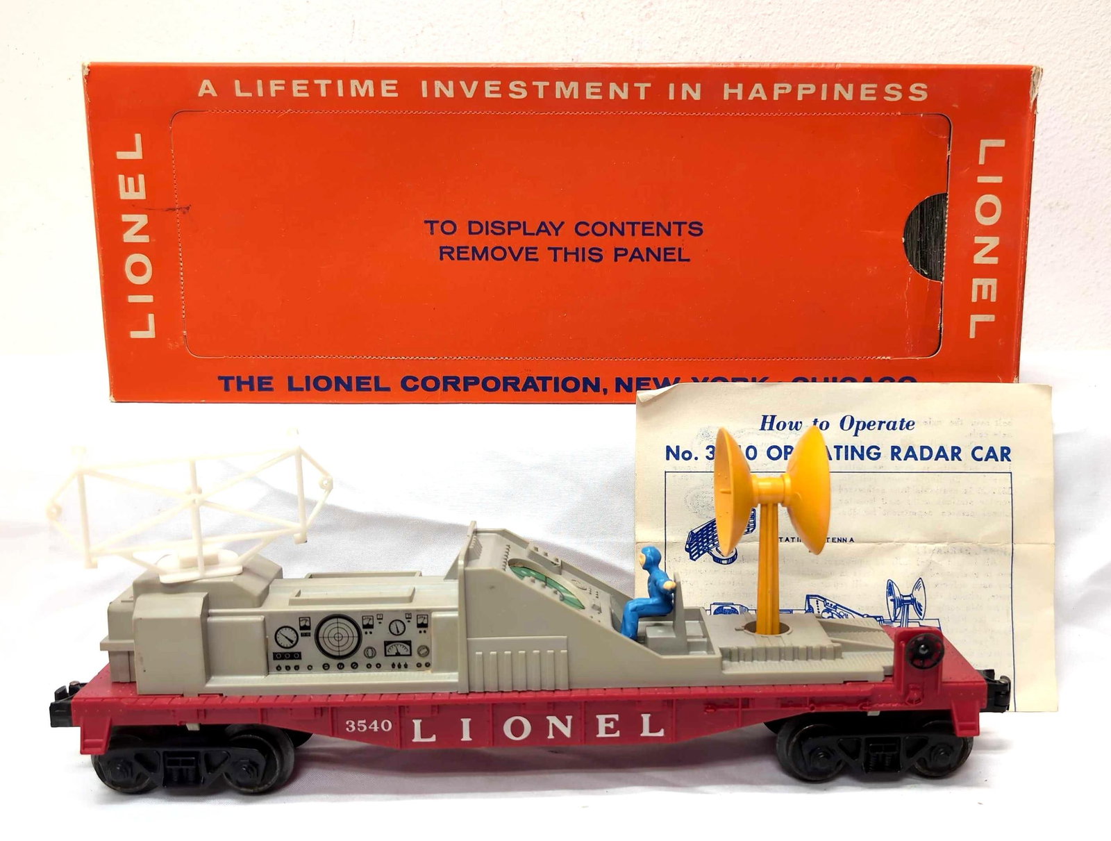 Postwar Lionel 3540 Operating Radar Scanning Car in box: Postwar Lionel O Gauge 3540 Operating Radar Scanning Scope Car in original box with instructions sheet. Car has reproduction radar dish, missing figure mount, reproduction figure C6. Box has missing P
