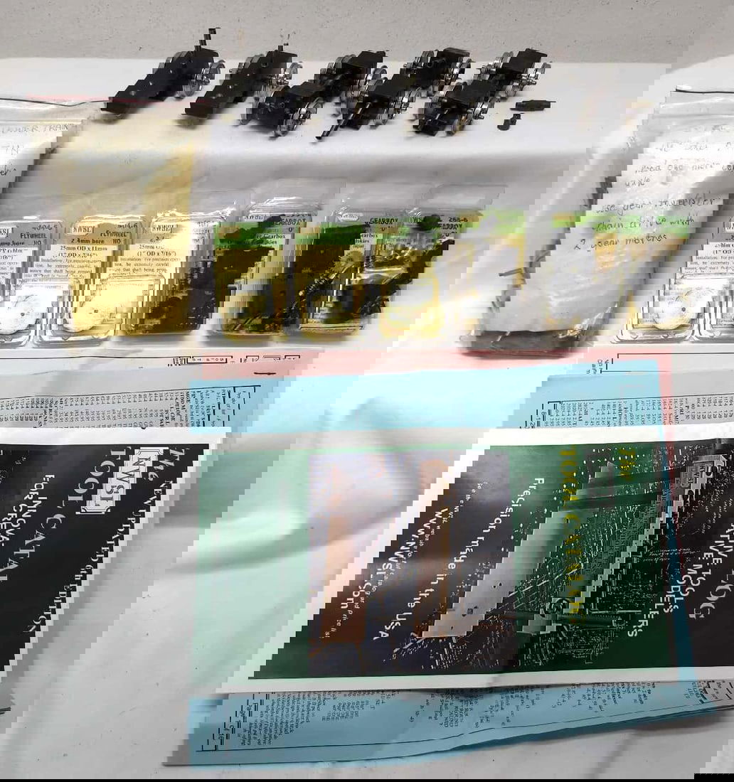 2-Rail brass O Scale Ajin NWSL GTEL Veranda: 2-Rail brass O Scale Ajin NWSL, possibly for GTEL Veranda powered truck parts. NorthWest Short Line flywheels and gearboxes, NIP. AJIN gearboxes/transmissions and towers, two packages with 8 wheel set