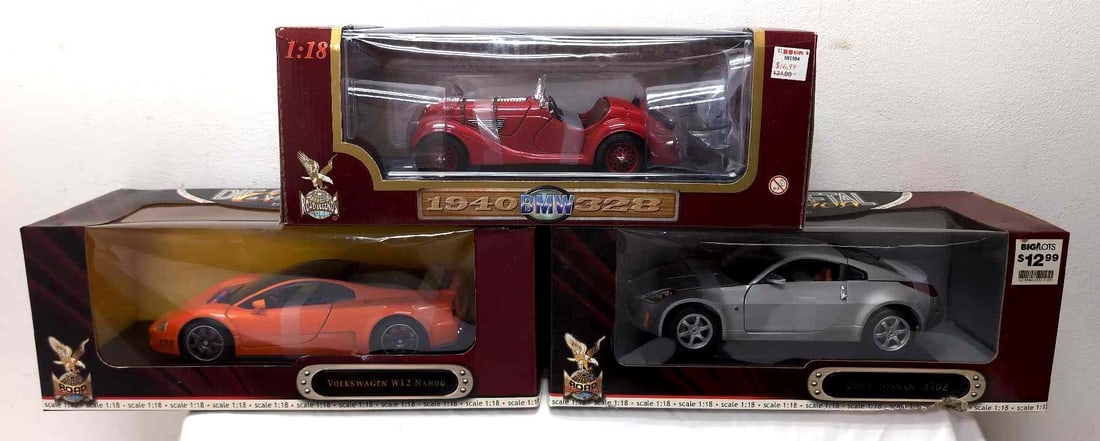 Three 1:18 Scale Road Signature and Road Legends Die Cast Cars (1 of 11)