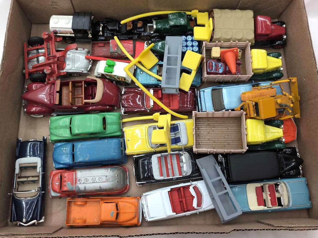 New Ray Ertl Matchbox NZG Tootsie Toy More: New Ray, Ertl, Matchbox, NZG, Tootsie Toy, Lledo, Hot Wheels and Lesney die-cast vehicles. One car is a built plastic model kit. Vehicles are in various conditions from played with and damaged to exce