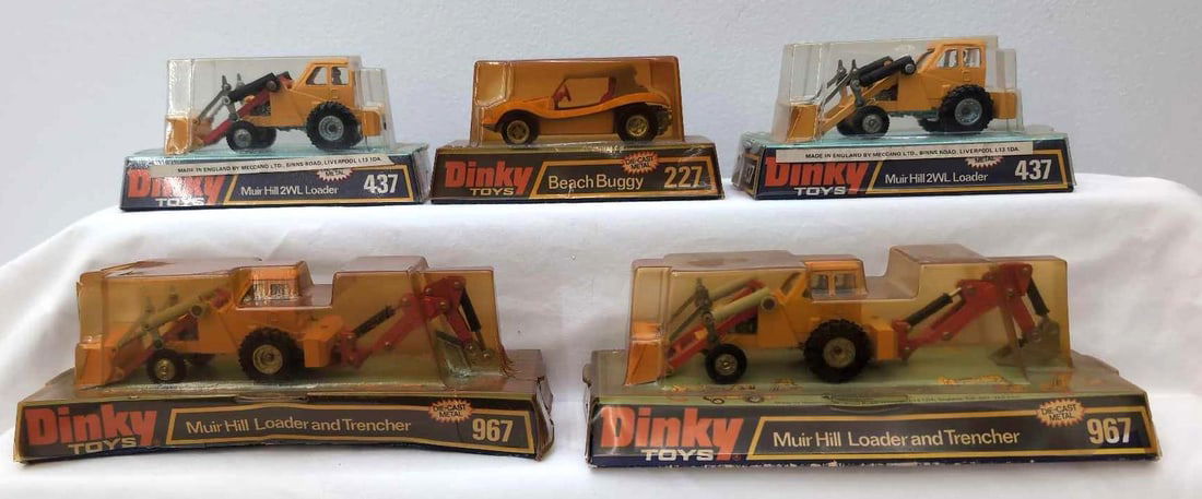 Dinky 437 437 227 967 967 vehicles in original packages: Dinky Toys two 437 Muir Hill 2WL Loaders, 227 Beach Buggy and two 967 Muir Hill Loader and Trencher, Mint die-cast vehicles in original packages. Vehicles appear to have never been removed from packag