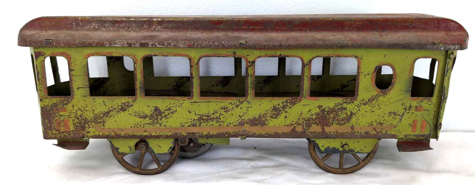 Dayton Schreible Hill Climber Interurban Trolley: Antique pressed steel Dayton Schreible Hill Climber Interurban Trolley floor pull toy. Trolley appears complete. Measures approximately 15" X 6". Trolley still shows what appears to be most of the ori