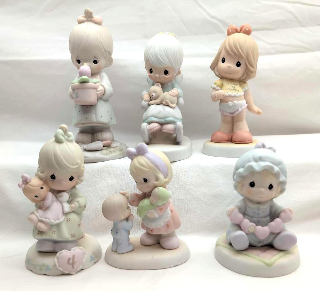Precious Moments 6 Grandma I'll Never Out Grow You The Purrfect Grandma and More: Precious Moments lot of six Grandma I'll Never Out Grow You, The Purrfect Grandma and More. This lot includes; Growing In Grace Age 4 136239, You Have Touched So Many Hearts 272485, You Have Such A Sp