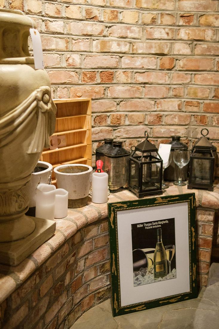 Assorted lot to include Large urn with swag and drape: Assorted lot to include Large urn with swag and drape, metal lanterns, crockery wine print and metal lidded containers