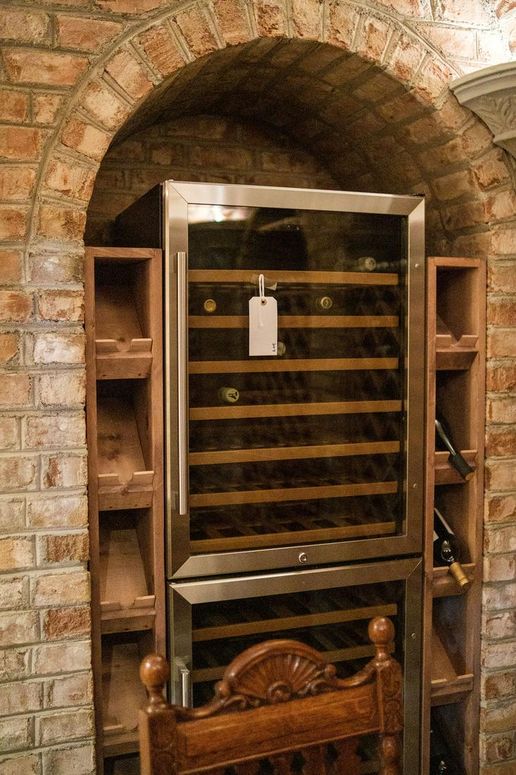 Summit Wine Seller 2-door: Summit Wine Seller 2-door, 14 shelf Model # SWC1875B, Approx. 73"H x 24"W