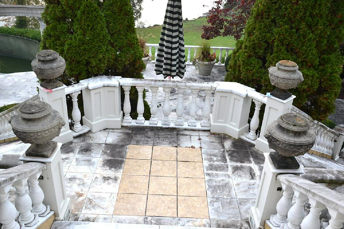 Pair (2) of lidded concrete Urns w/lions head and bell (1 of 2)