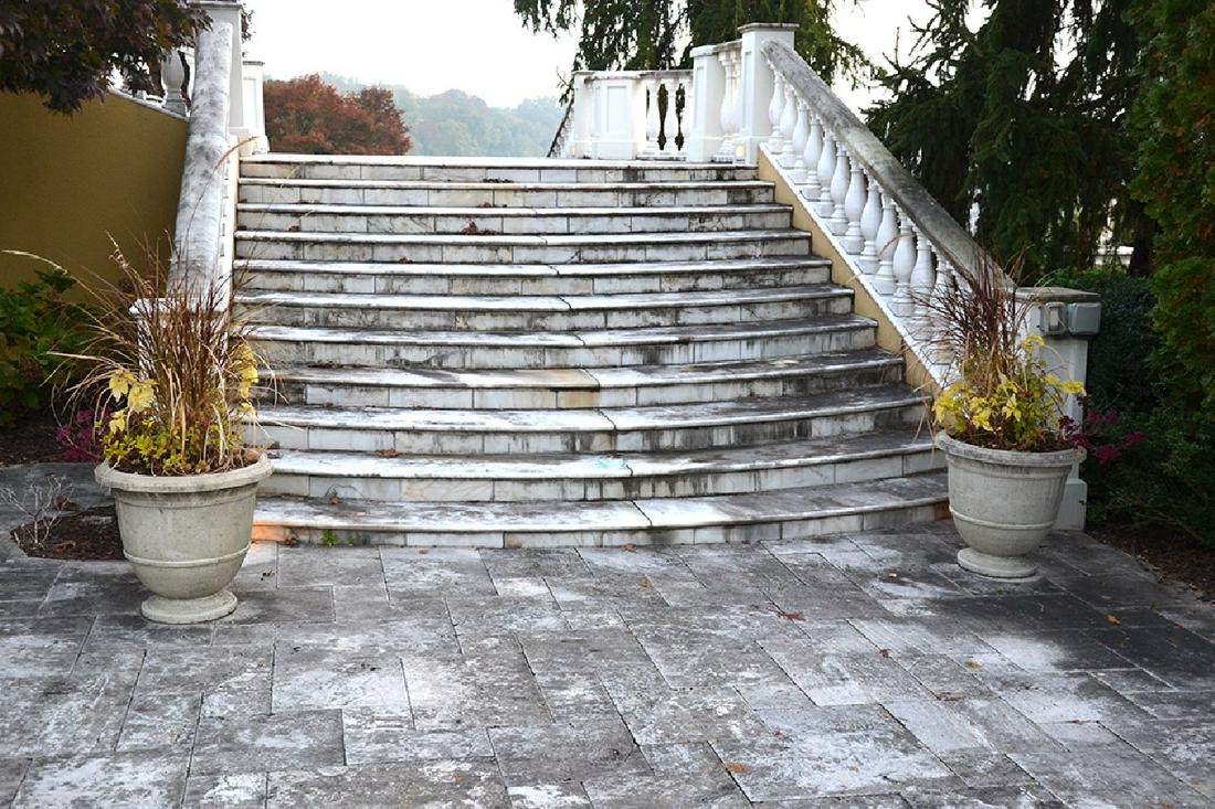 Pair (2) of footed concrete planters (1 of 3)