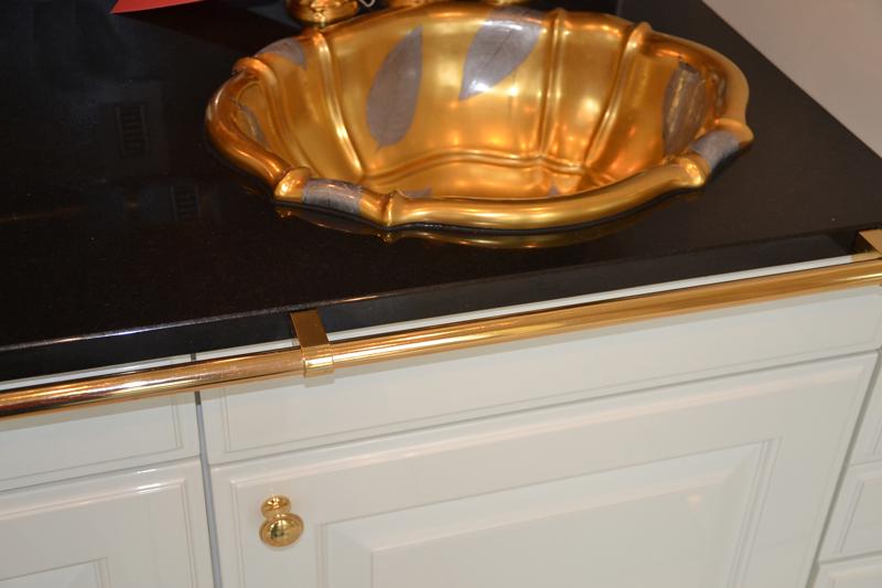 Oval Sherle Wagner sink with silver leaves and matching (1 of 3)