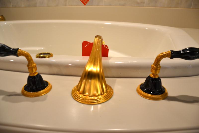 Sherle Wagner Black & Gold Tub Faucets: Sherle Wagner Black & Gold Tub Faucets, Hand Spray, and toilet paper holder