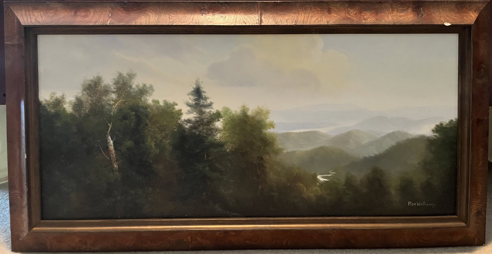 Framed Original Ron Williams Oil on Canvas, Summer Valley River Surrounded by Mountains from: Framed Original Ron Williams Oil on Canvas, Summer Valley River Surrounded by Mountains from Hillside, 34" x 18" (slightly damaged frame)