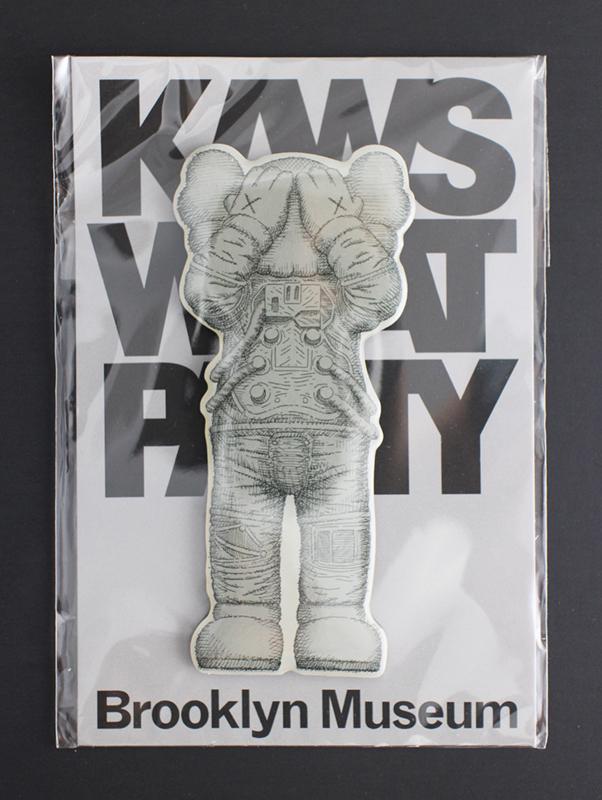 KAWS (American, b.1974) "What Party?" grey magnet, brand new, 4 x 2 in. (1 of 3)