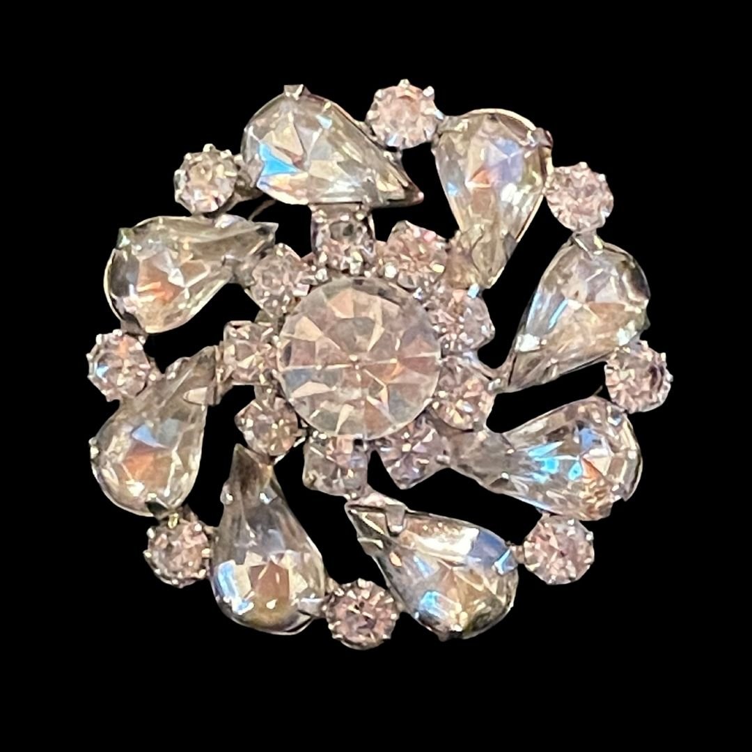Vintage Roundabout Rhinestone Pin: This is a stunning Vintage Rhinestone pin. Perfect for the Hollidays - Gift it, or just keep it for your favorite winter jacket for instant snow bunny style!