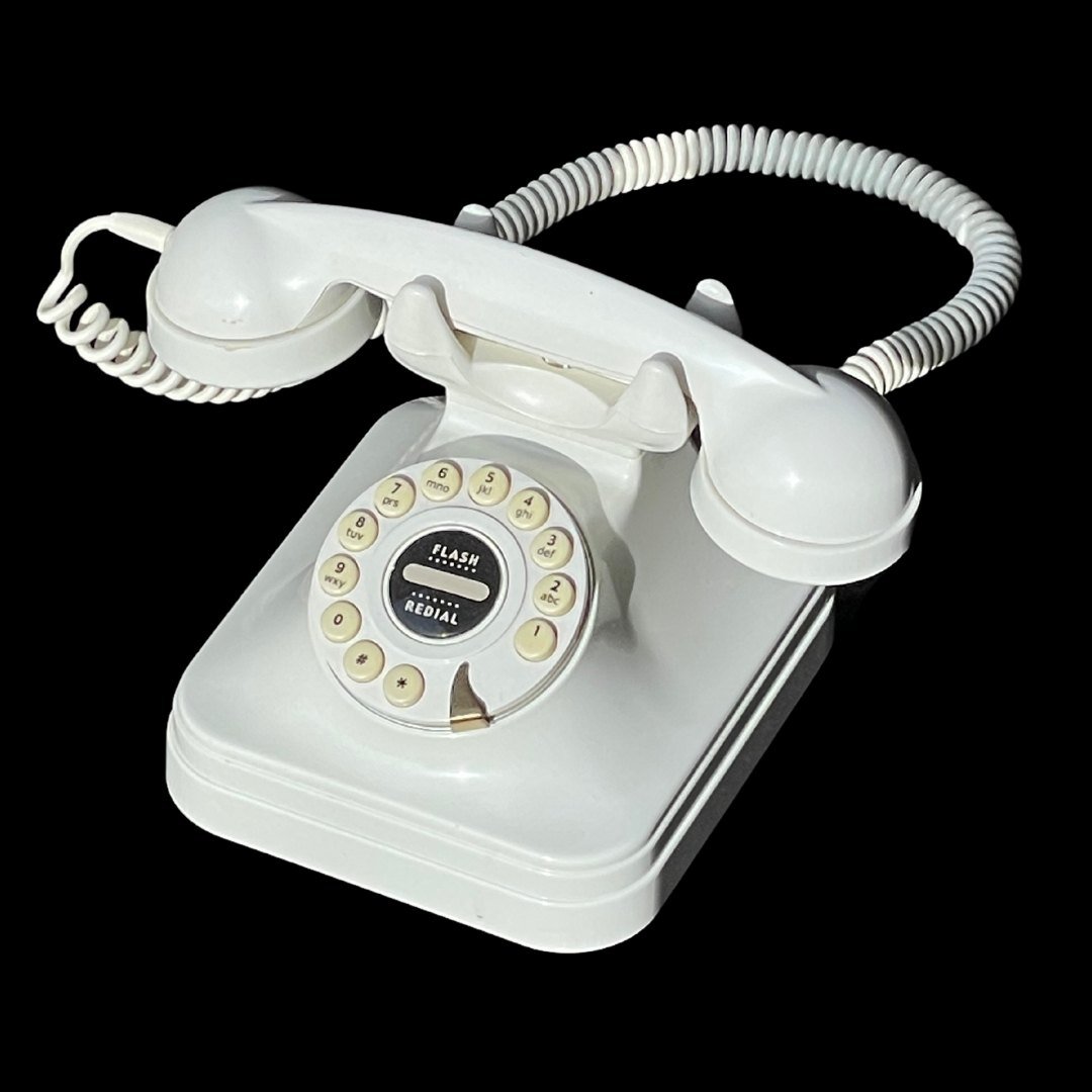 Vintage Look Cradle Style Dial Phone: Give your home or business a vintage vibe with this working telephone!Originally Sold by Pottery Barn.