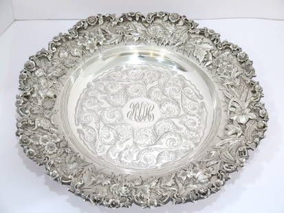 15 in - Sterling Silver S. Kirk & Son Antique Museum-Level Floral Repousse Plate: Dimensions: 15 x 2 in Weight: 55 toz This is a museum-level sterling silver repousse large serving plate that was made by Samuel Kirk & Son.