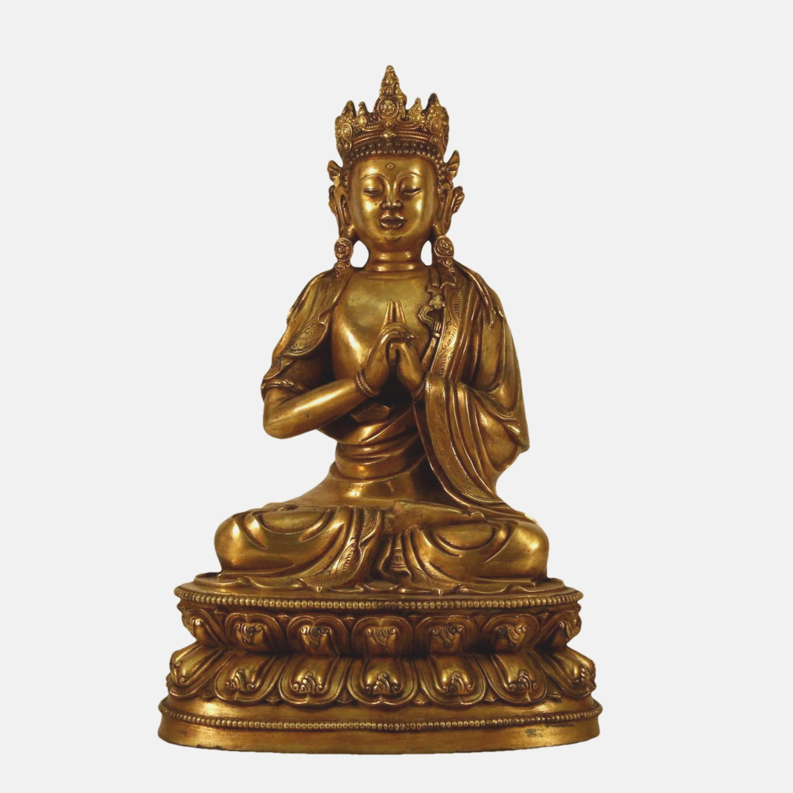A Gilt-Bronze Figure Of Bodhisattva: A Gilt-Bronze Figure Of Bodhisattva. Seated on a double-lotus base with a peaceful expression, rendered clad in long, flowing robes, the voluminous drapery elegantly cascading in folds, topknot surmou