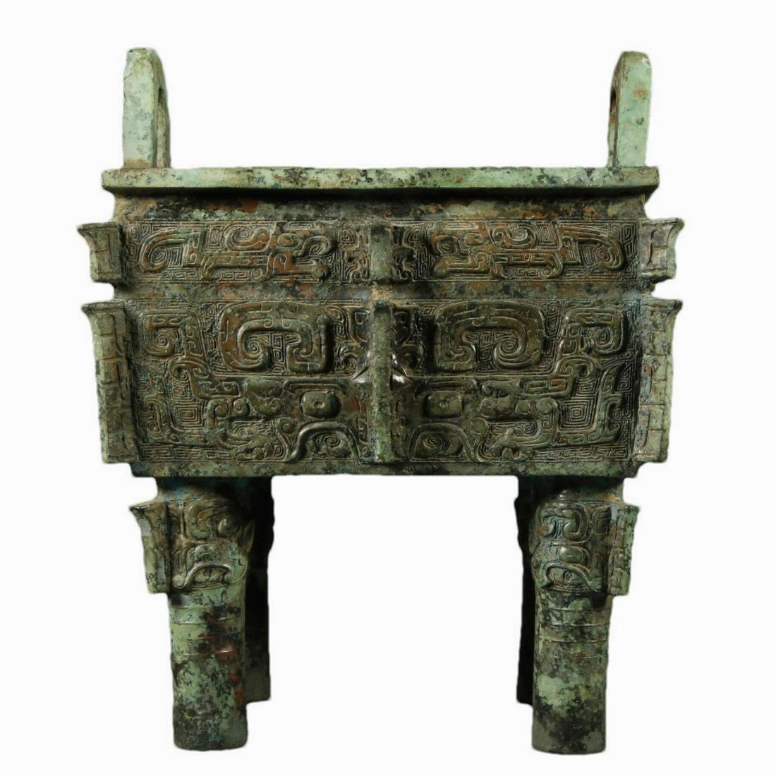 A Ancient Bronze 'Animal Mask' Quadripod Ritual Food Vessel, Ding, With Inscriptions (1 of 10)