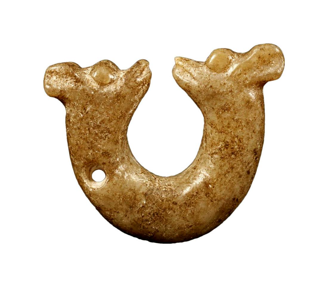 A Hongshan Culture Jade 'Dragon' Pendant. (1 of 4)