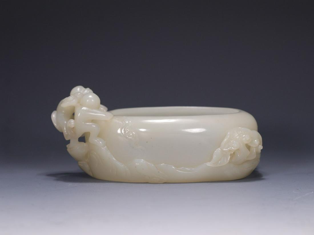 A Hetian Jade 'Monkey' Brushwasher (1 of 9)