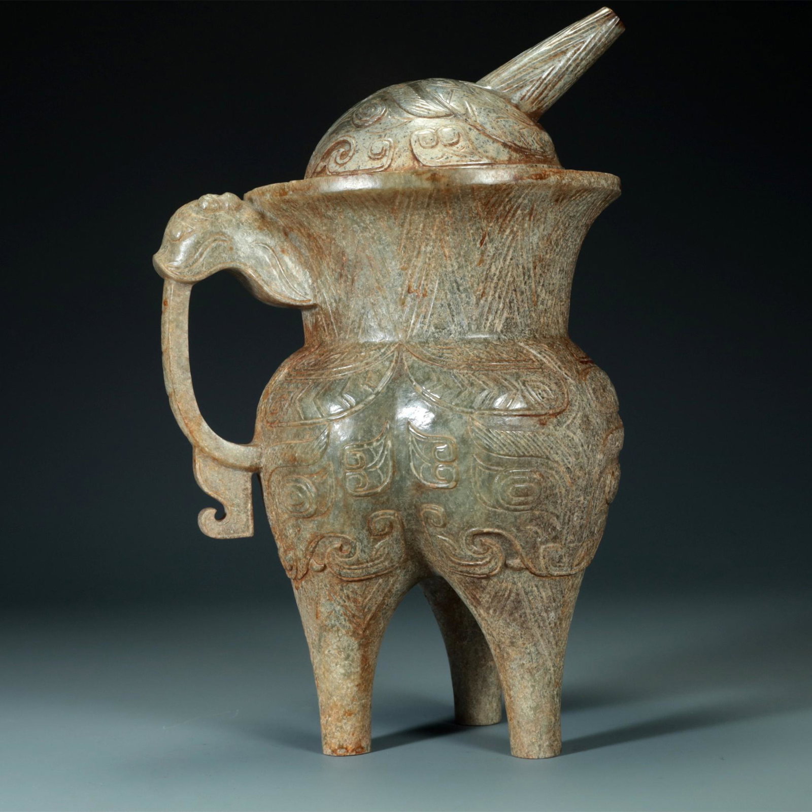A Gaogu Celadon Jade 'Animal Mask' Tripod Ewer (1 of 12)