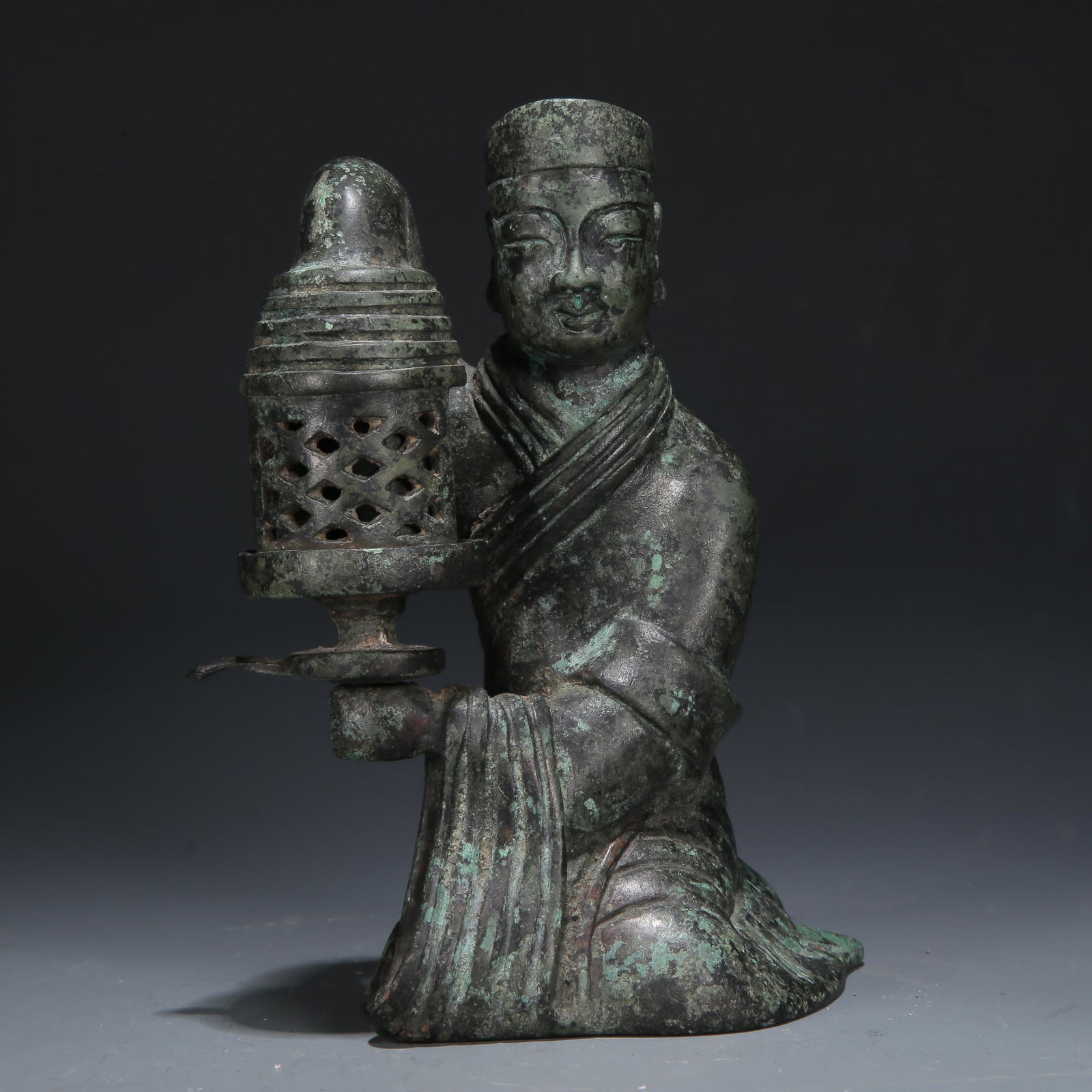 A Bronze 'Attendant Girl' Lantern (1 of 9)