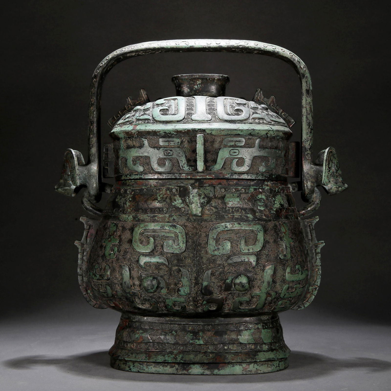A Bronze 'Animal Mask' Censer With An Overhead Handle (1 of 11)