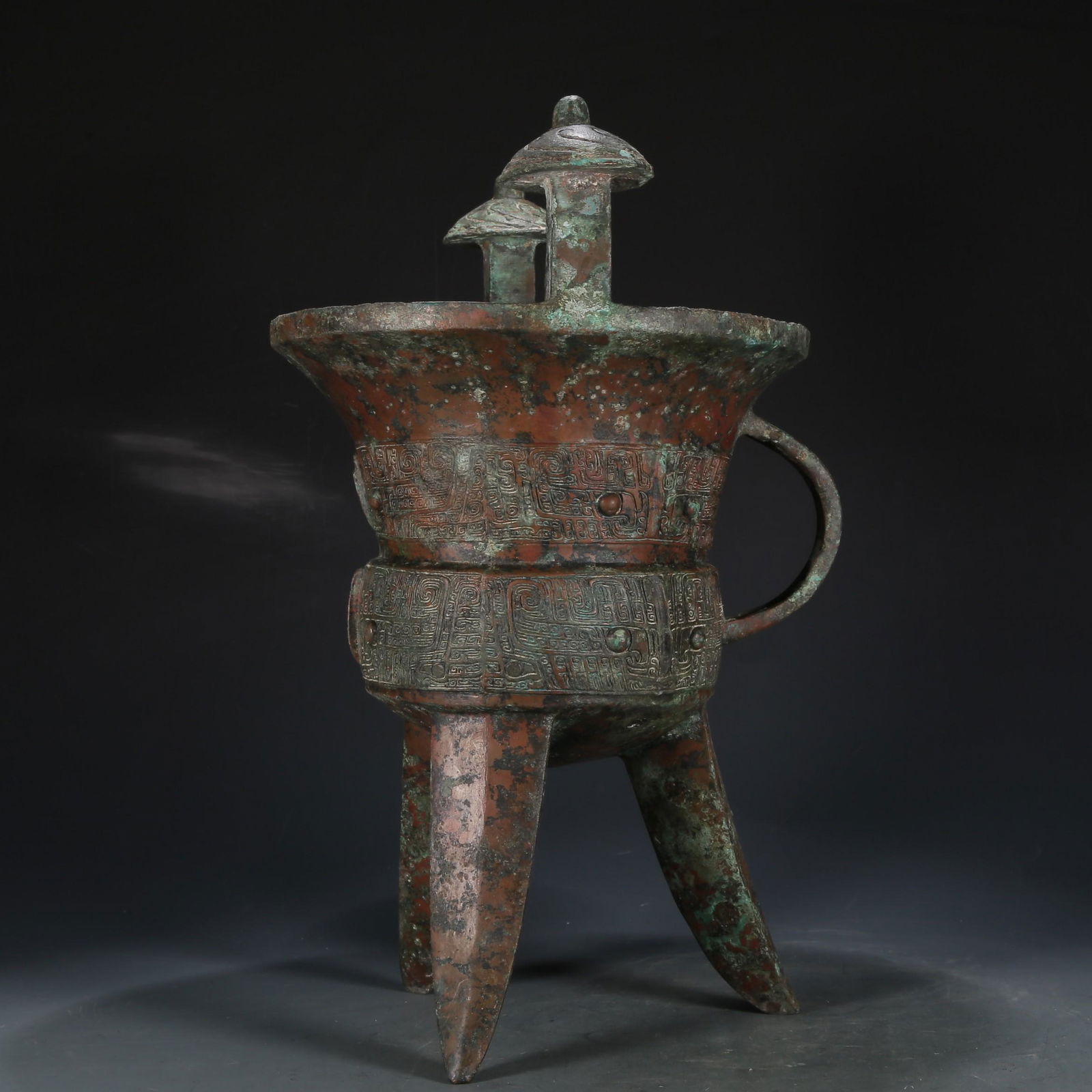 A Superb Bronze 'Animal Mask' Tripod Ritual Cup With Inscriptions (1 of 9)